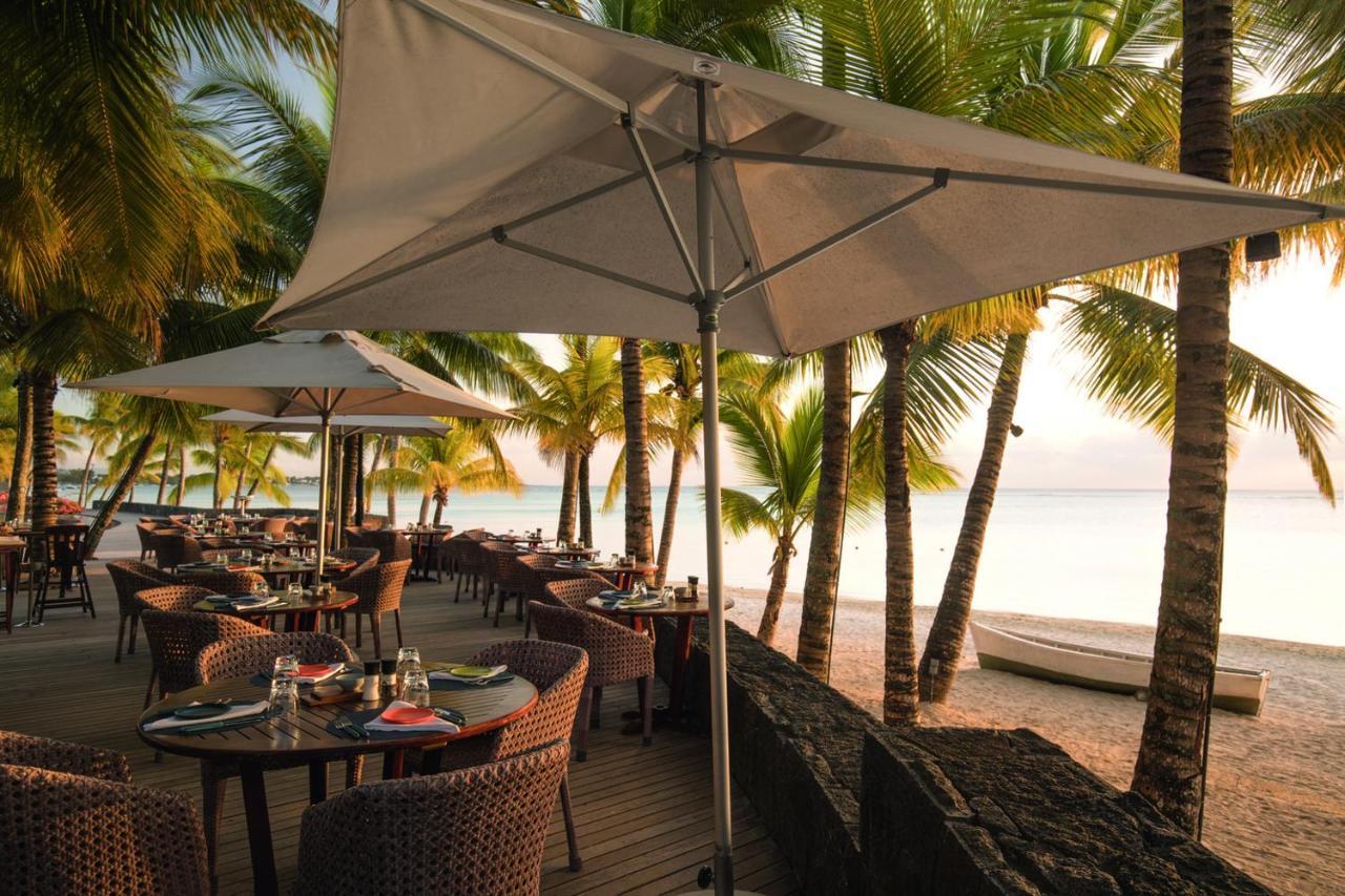Trou Aux Biches Beachcomber Golf Resort & Spa Exterior photo Beachfront dining at the Seychelles