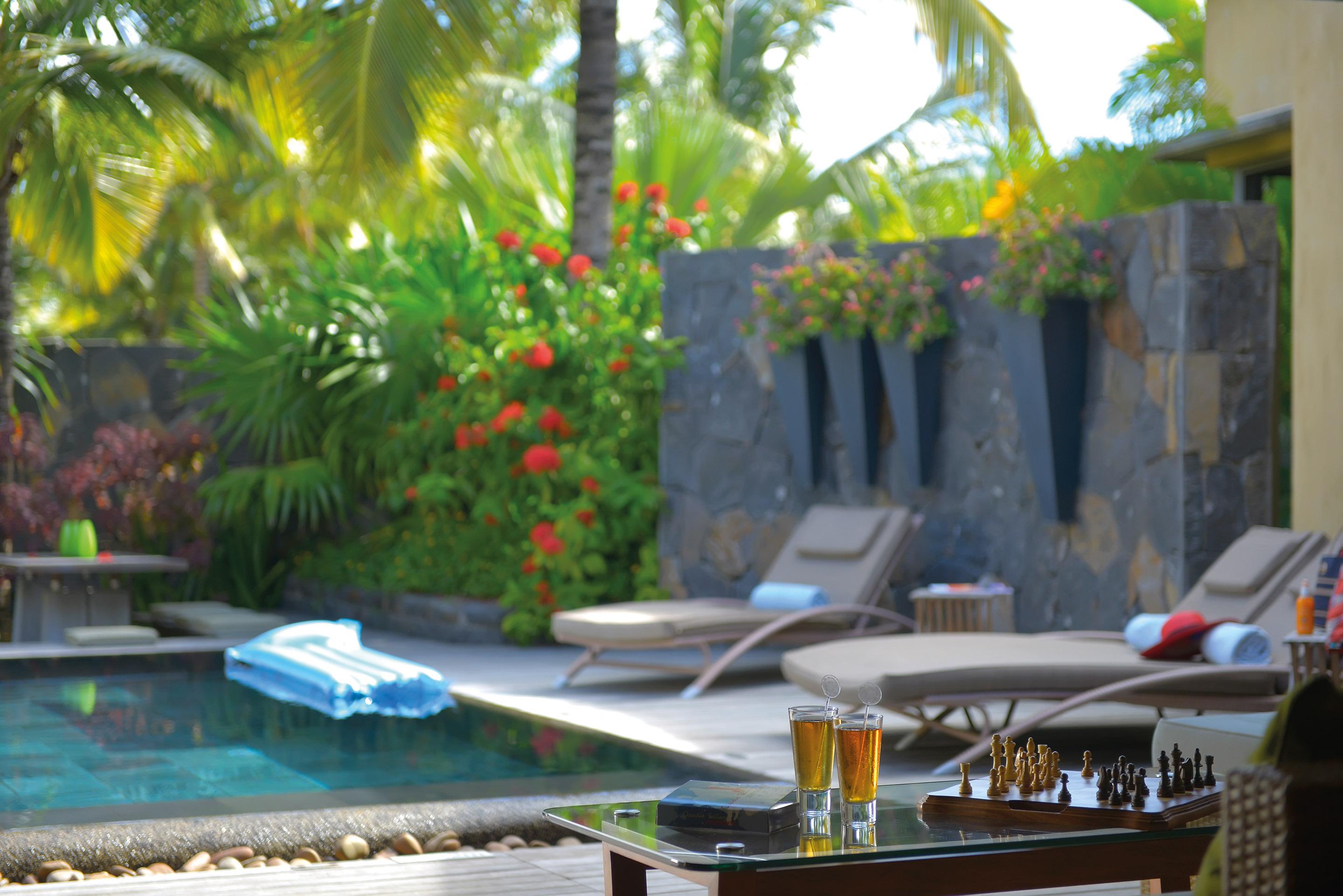 Trou Aux Biches Beachcomber Golf Resort & Spa Exterior photo A pool at the resort