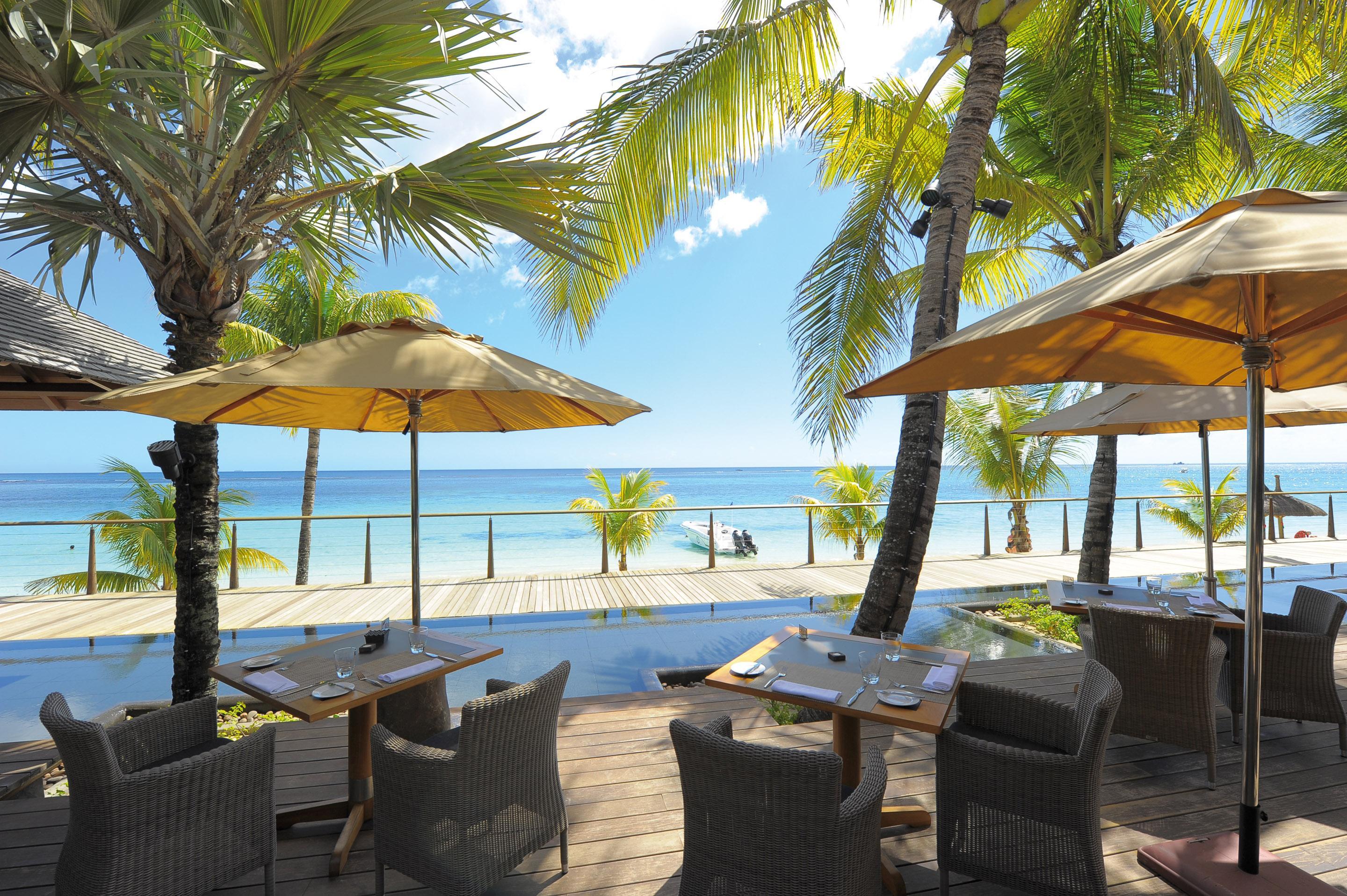 Trou Aux Biches Beachcomber Golf Resort & Spa Exterior photo Beachfront dining at the resort