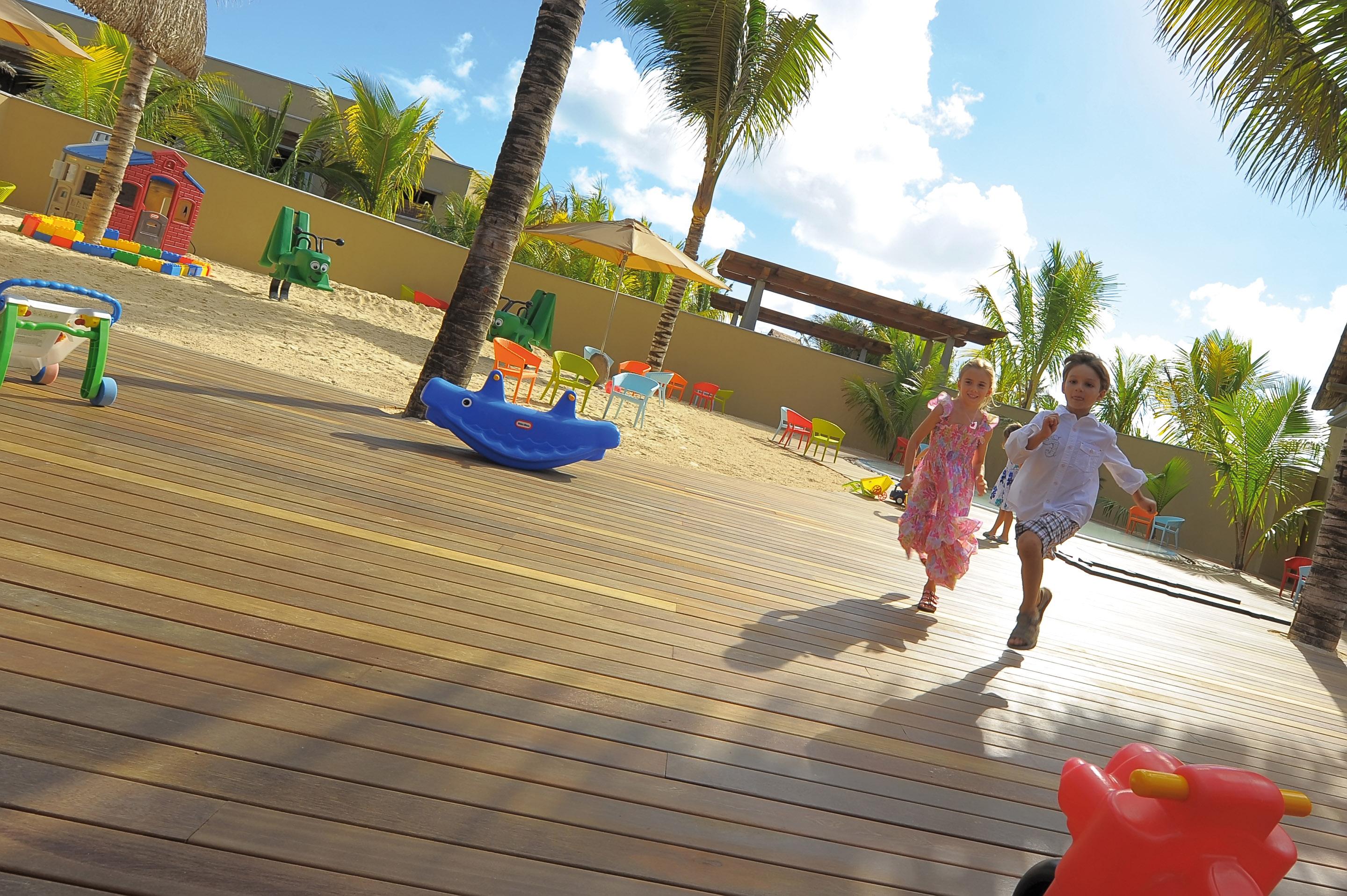 Trou Aux Biches Beachcomber Golf Resort & Spa Exterior photo Children playing at the resort